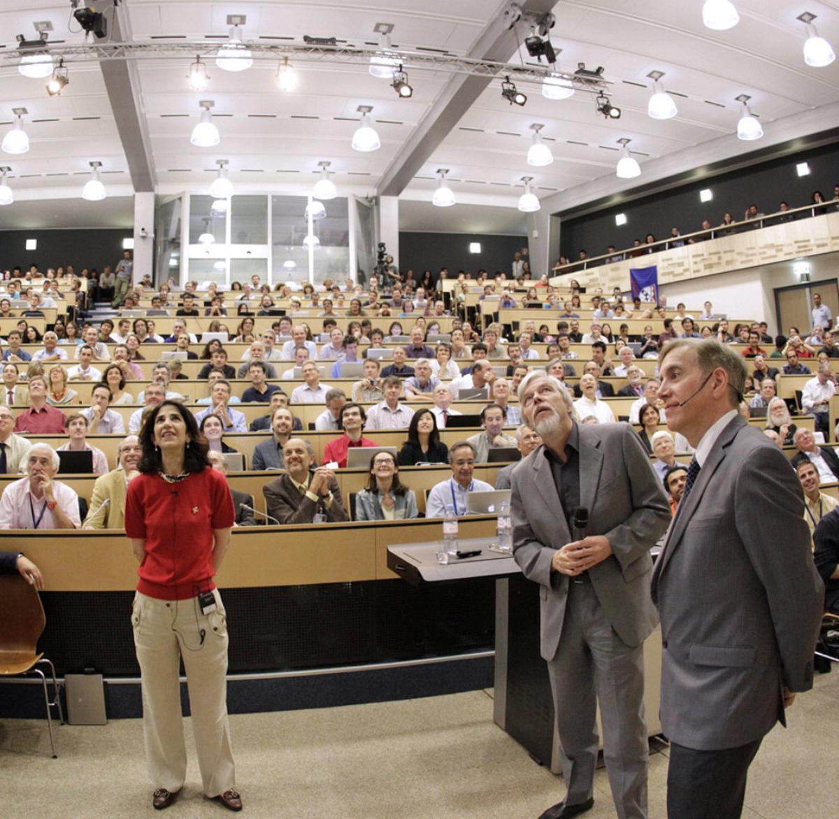 Fabiola Gianotti, then spokesperson of the ATLAS detector at the LHC announcing the discovery of a particle consistent with the Higgs boson at CERN on July 4, 2012. 
