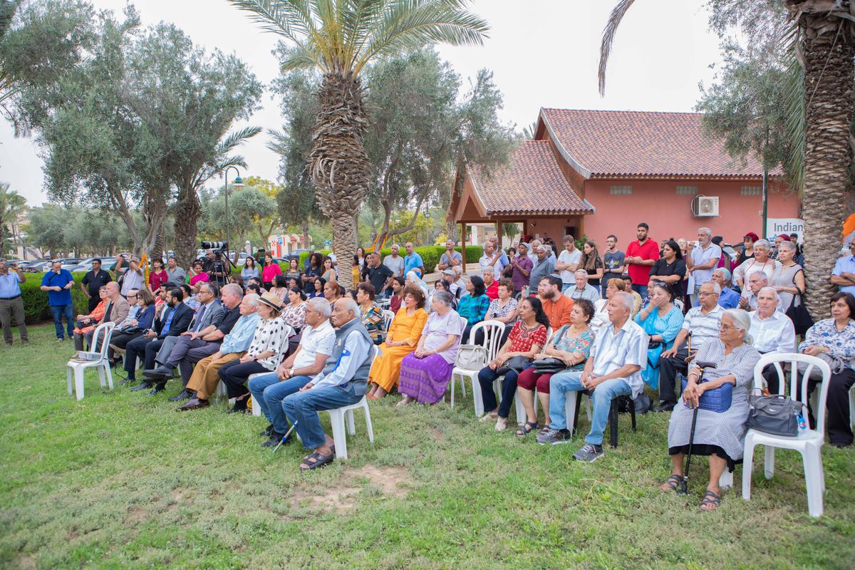 Hundreds of attendants gather at the lawns of the Cochin Jewish Heritage Center, during the laying of the foundation stone for the Heritage and Cultural Center of Indian Jews in Nevatim on June 8, 2023.