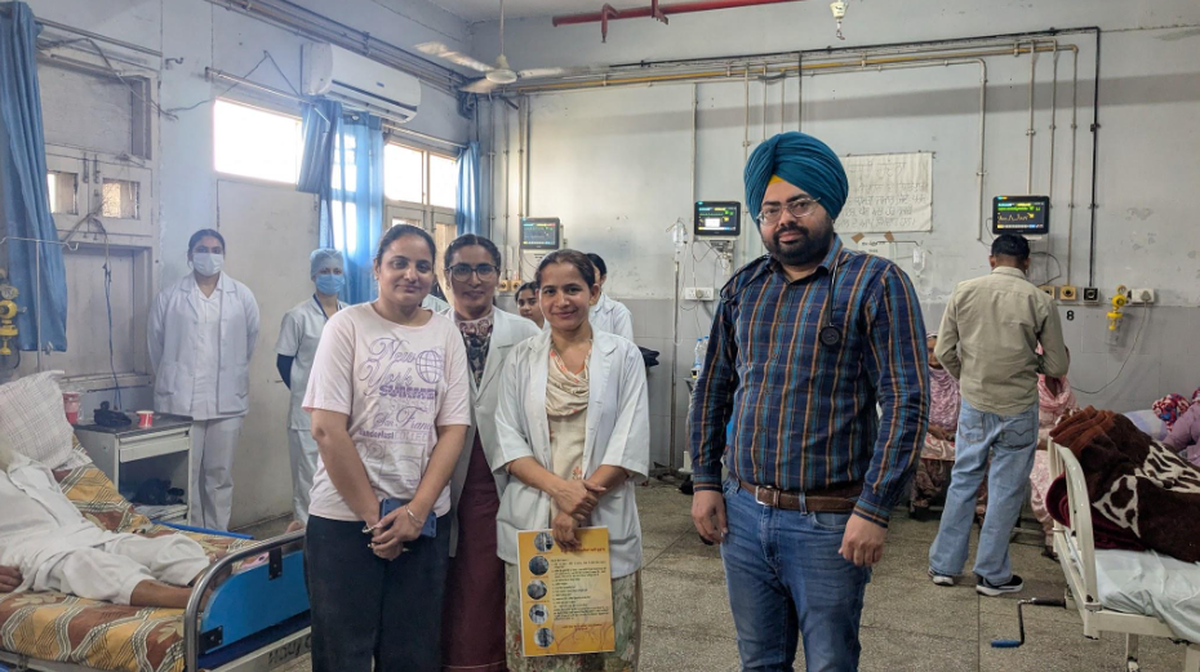 Dr. Parminder Singh Manghera, Assistant Professor, Cardiology with the nursing staff at GMC Amritsar.