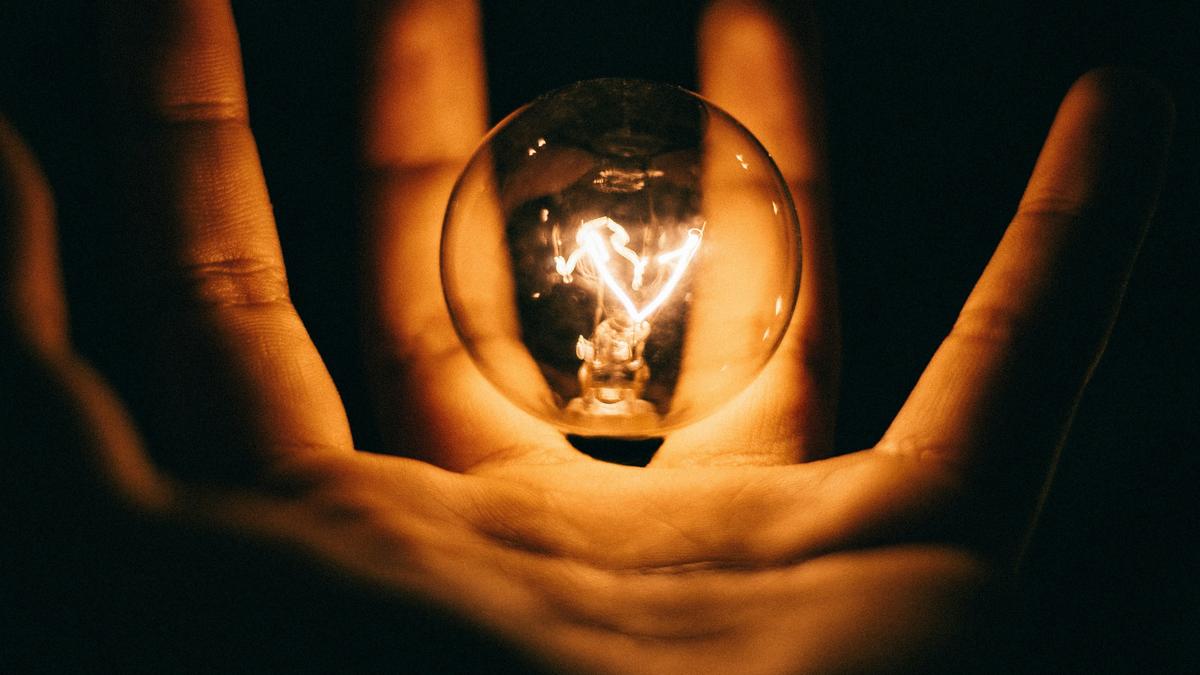 Researchers in a lab conducting experiments on light