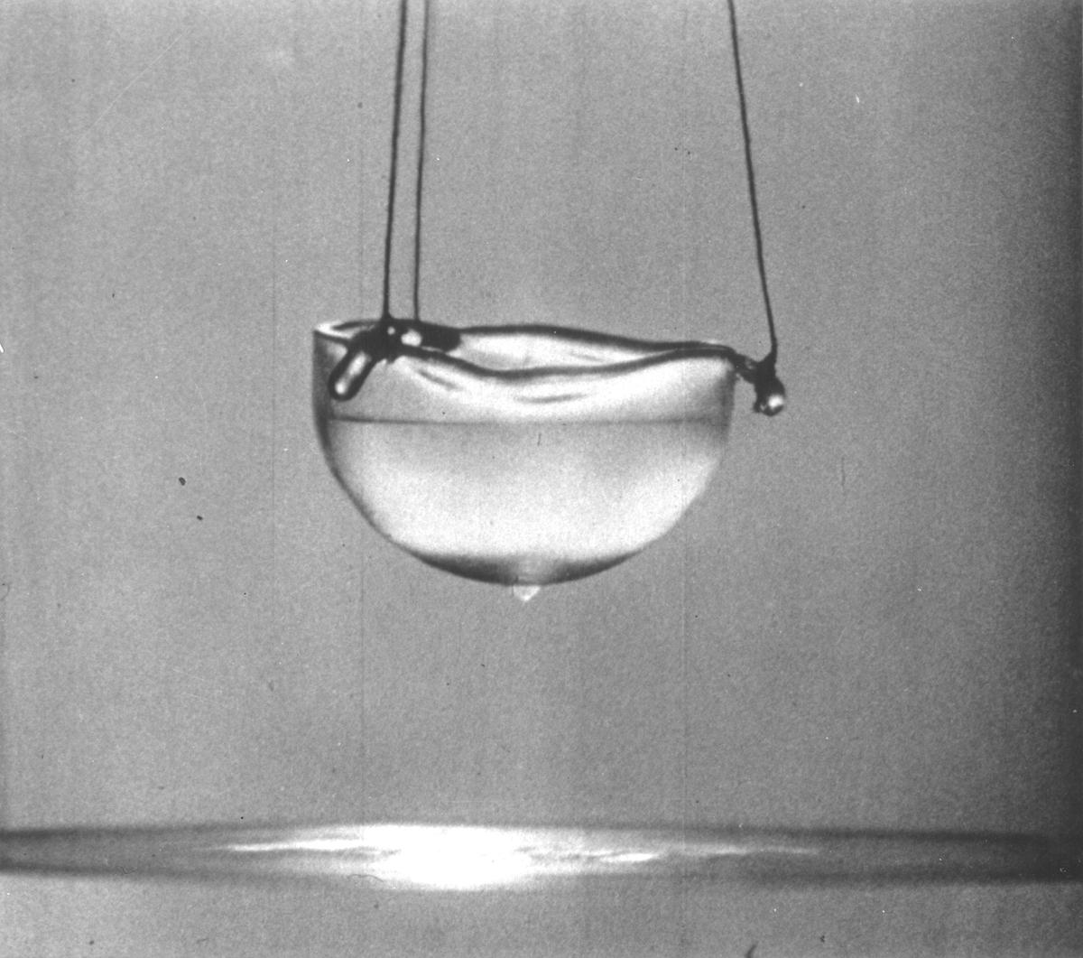 Superfluid helium can creep up the surface of the cup, climb out, and drip down from the bottom. Classical fluids can’t do this. Superfluid helium can creep up the surface of the cup, climb out, and drip down from the bottom. Classical fluids can’t do this.