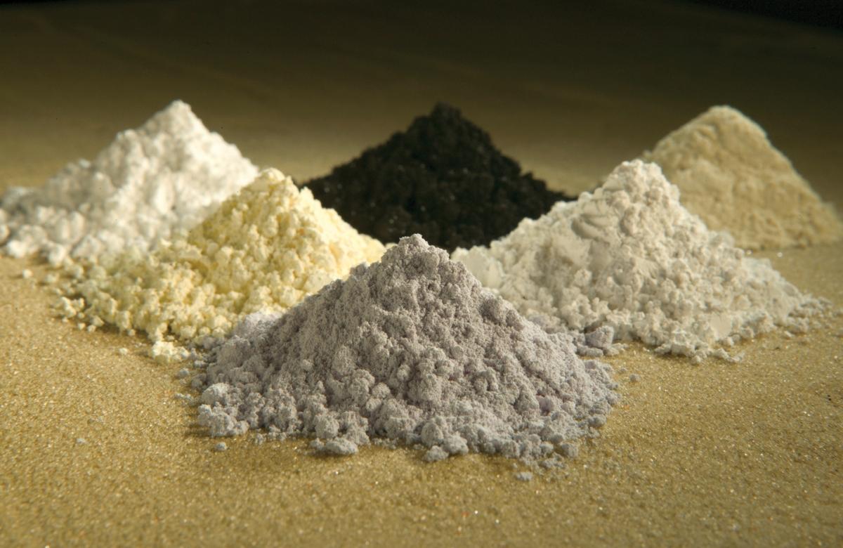 Rare-earth oxide powders are typically heavy and gritty. Clockwise from top-centre: praseodymium, cerium, lanthanum, neodymium, samarium, and gadolinium. Rare-earth oxide powders are typically heavy and gritty. Clockwise from top-centre: praseodymium, cerium, lanthanum, neodymium, samarium, and gadolinium.