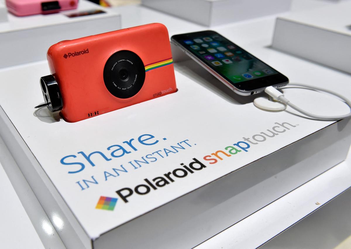 Nové technologie, například okamžité fotografické tiskárny, umožňují filmové fotografii žít novými způsoby (soubor) Nové technologie, například okamžité fotografické tiskárny, umožňují filmové fotografii žít novými způsoby (soubor)