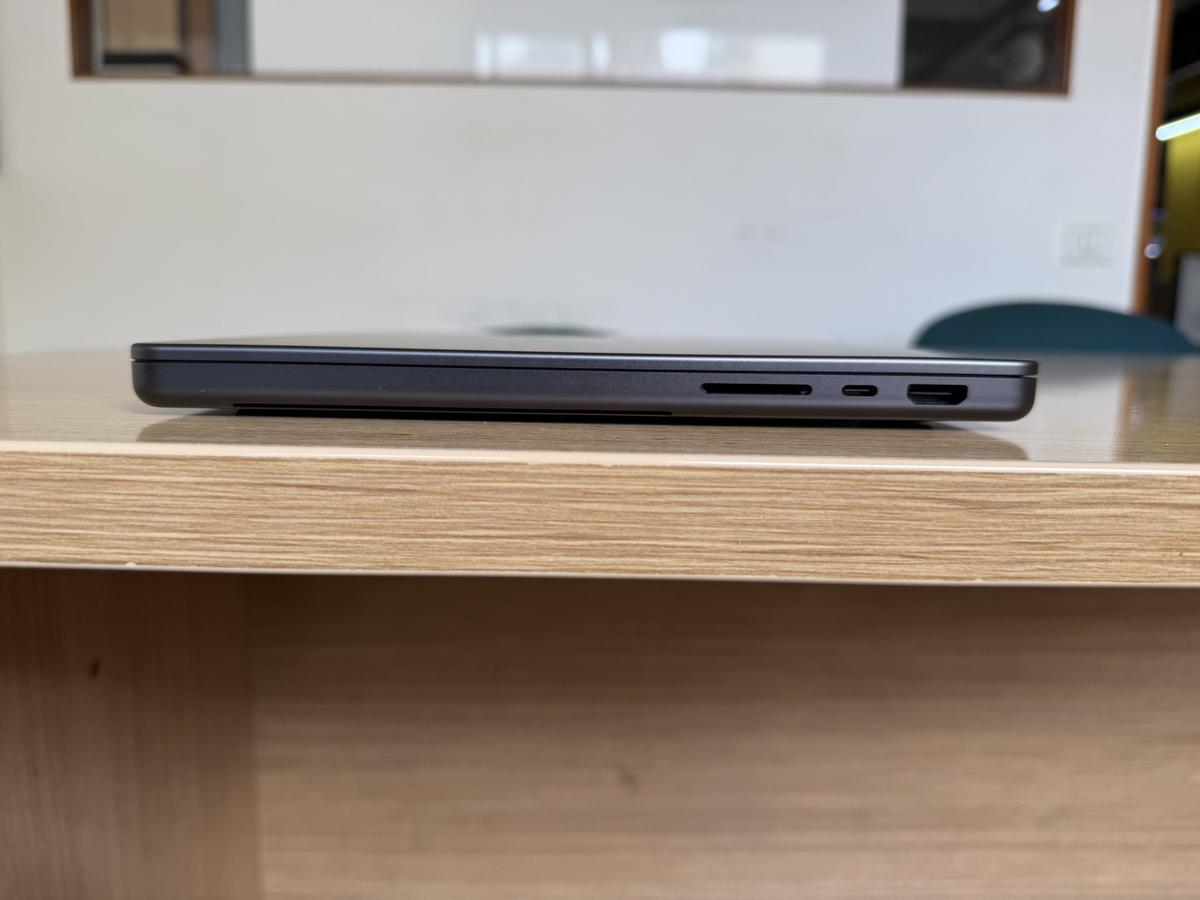 A side view of the Apple M5 MacBook Pro, showing the HDMI and SDXC slots