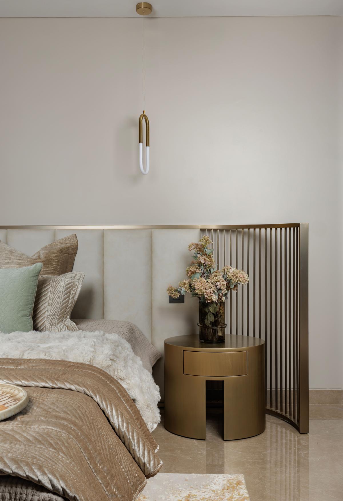 In the hush of neutrals and brass, scent takes over where sight ends.