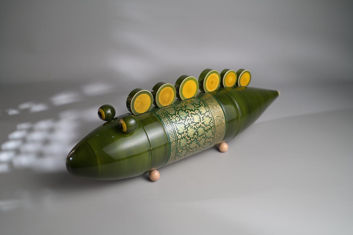 Snappy, the wooden crocodile by Varnam.