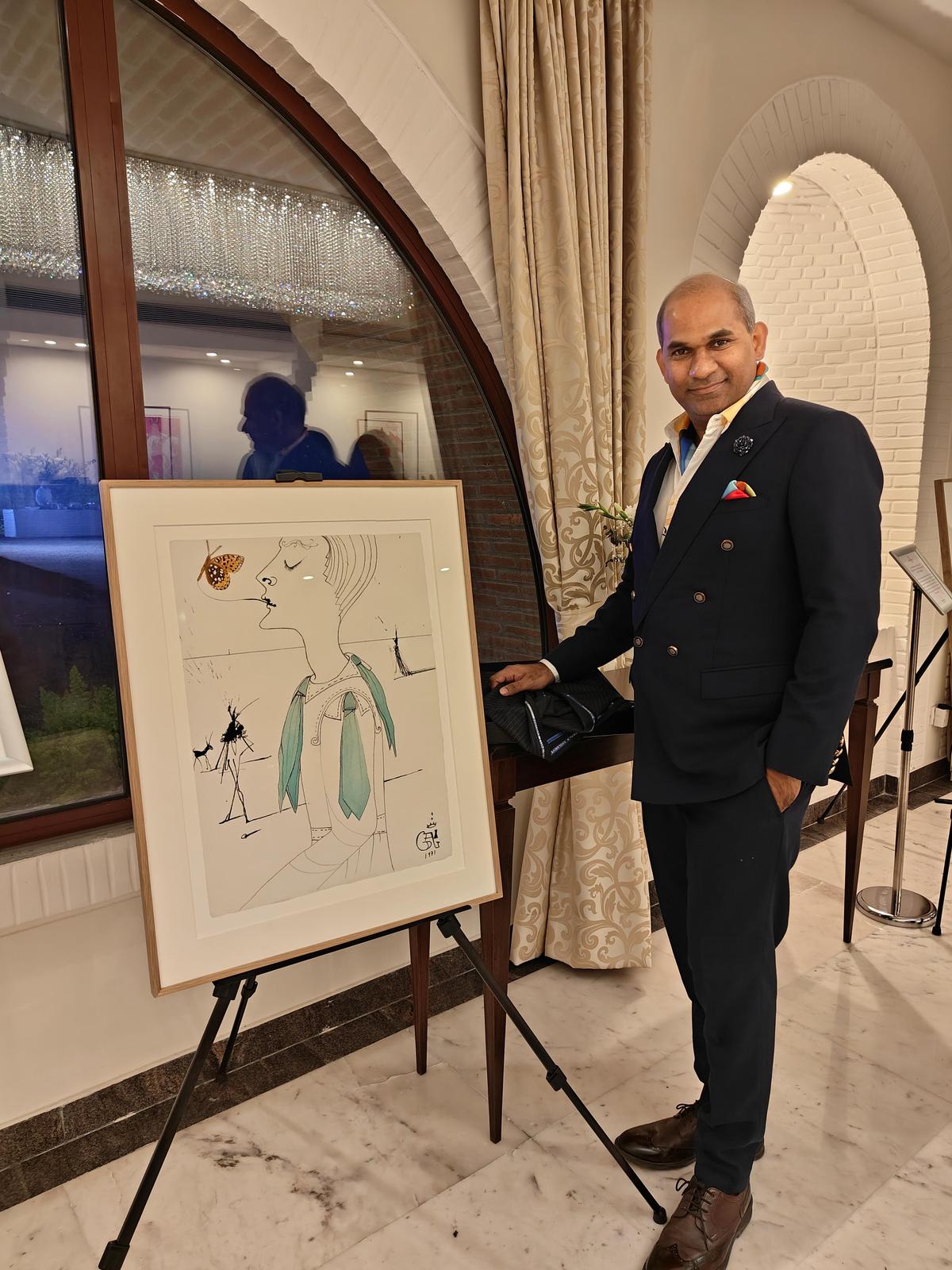 Ketan Pishe with the Dali painting. Ketan Pishe with the Dali painting.