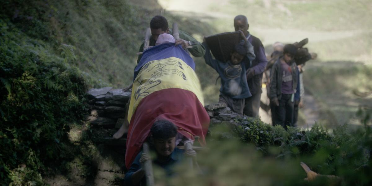 Children carrying a body to the river in a still from the Nepali film ‘White Sun’ (2016).