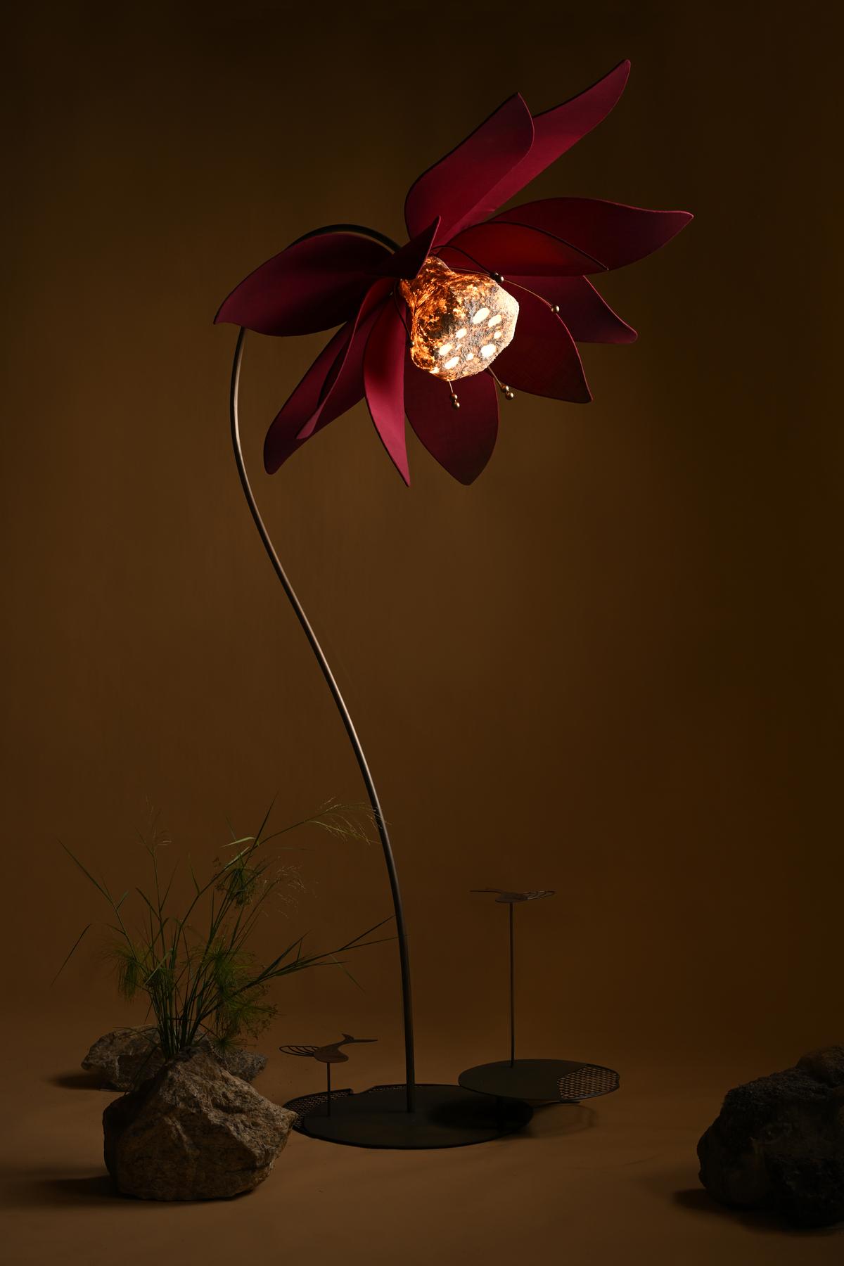 The Tamara Floor Light distils a lily pond into one sculptural piece. The Tamara Floor Light distils a lily pond into one sculptural piece.
