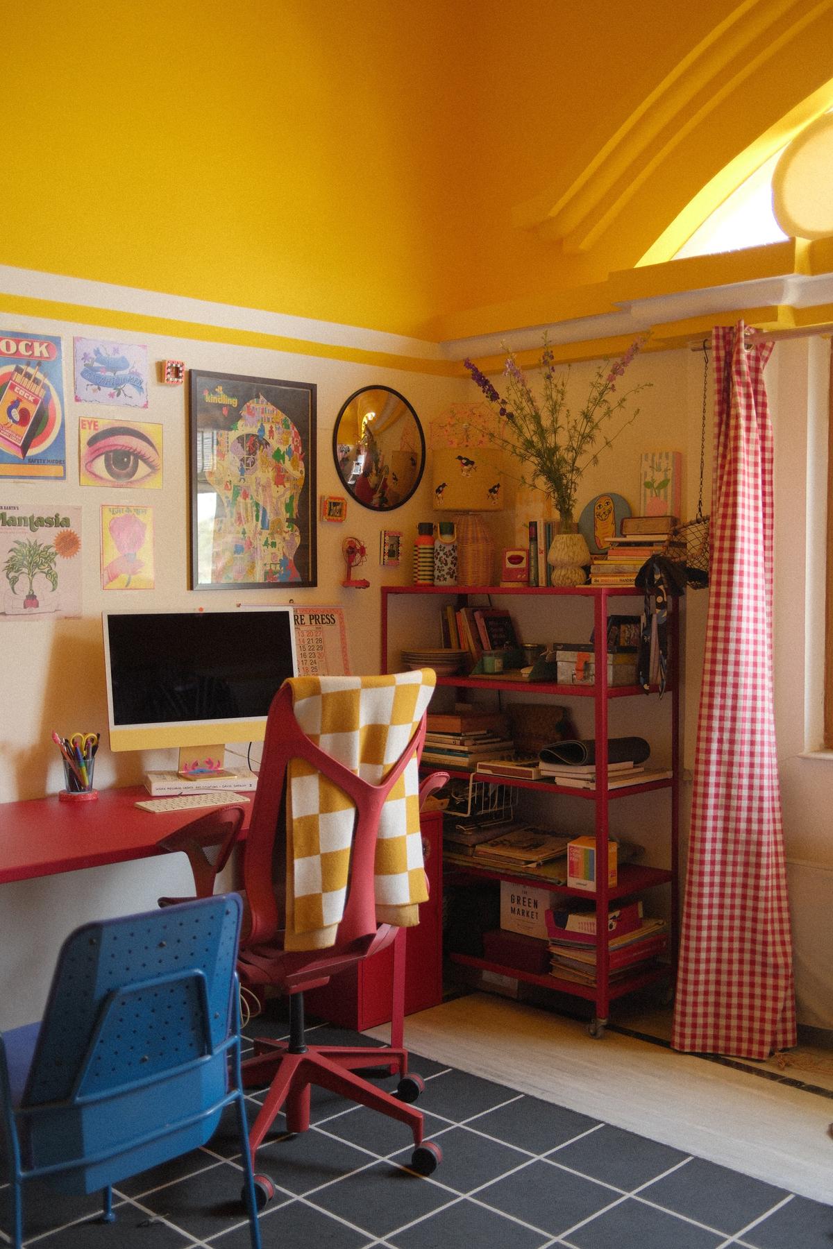 A sunny, canary-hued ceiling energises the interiors of Mehek’s home office, doubling the presence of light within. 