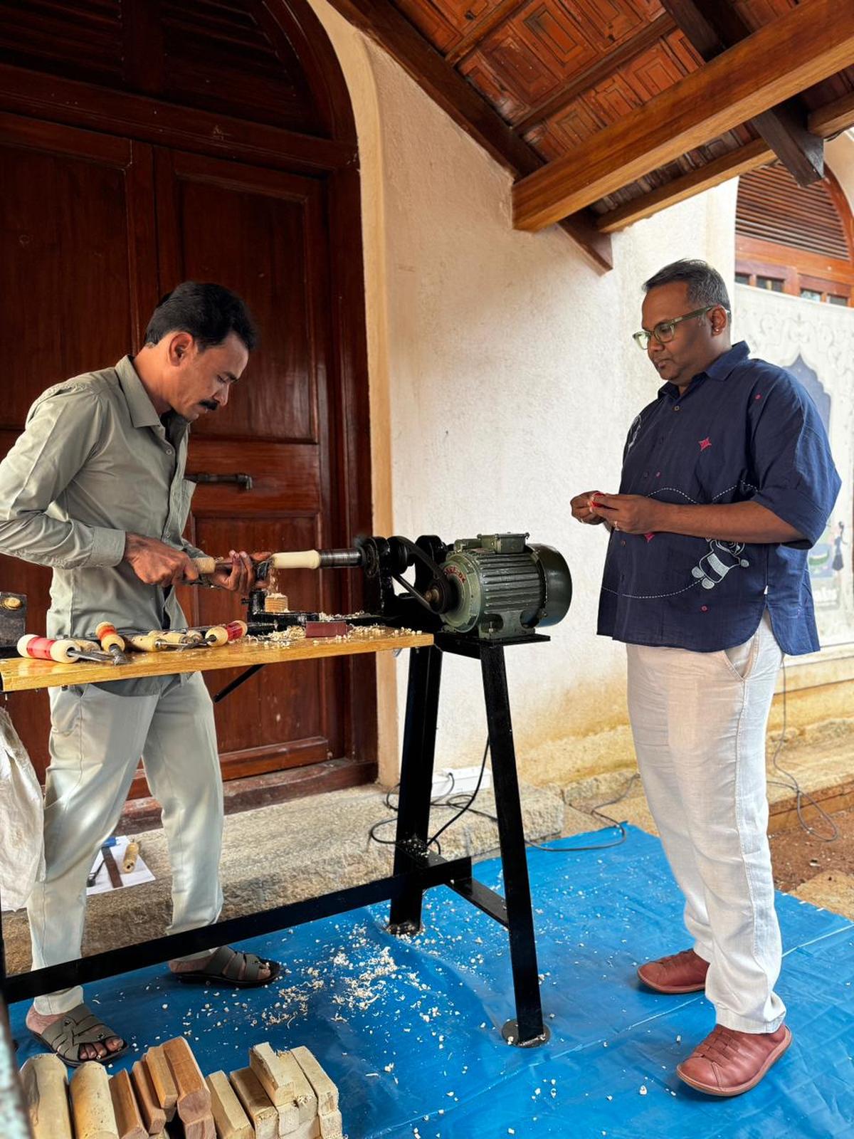 Vaidyanathan (right) with a craftsman.
