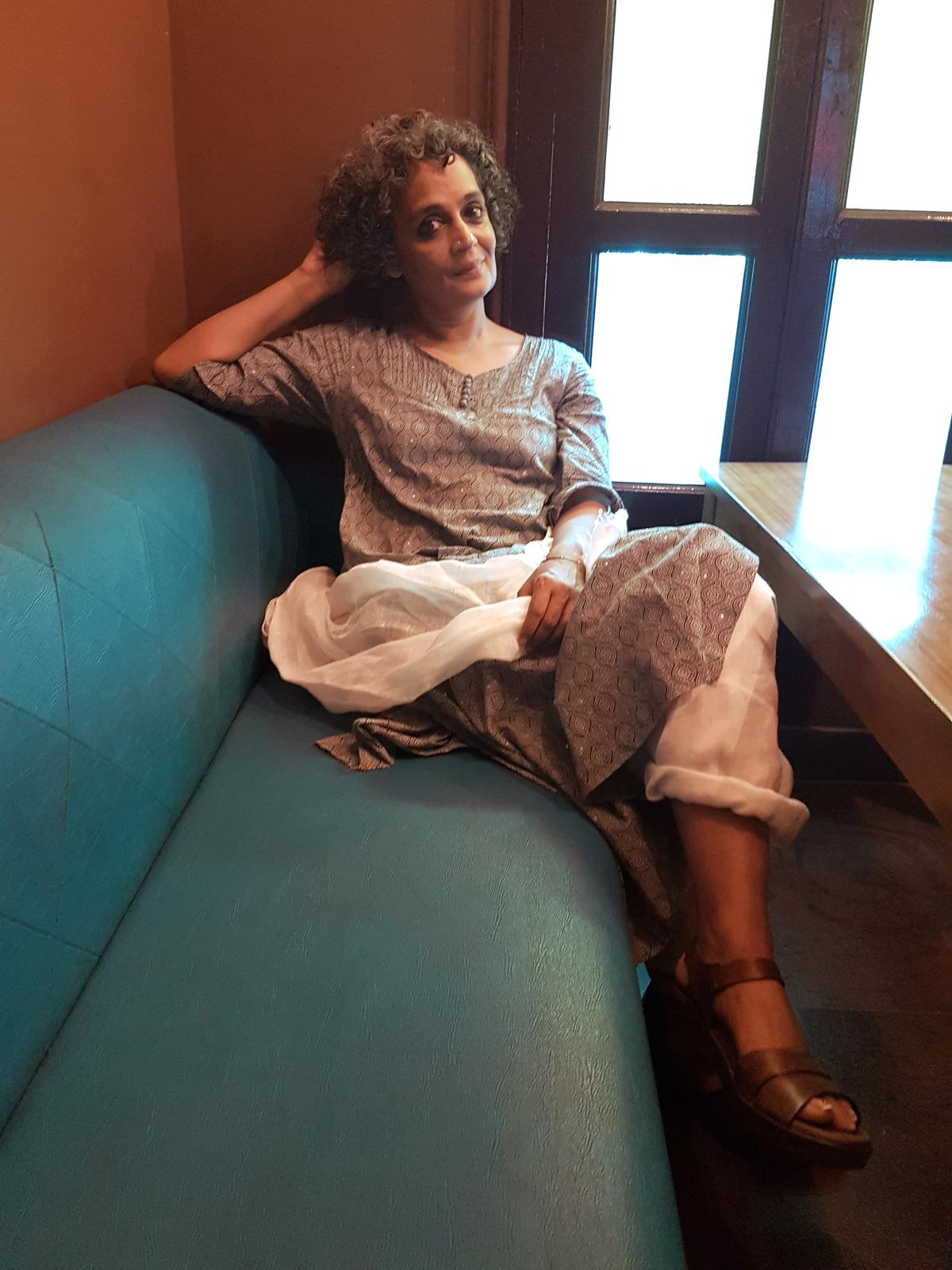 Arundhati Roy in a cafe in New Delhi. Arundhati Roy in a cafe in New Delhi.