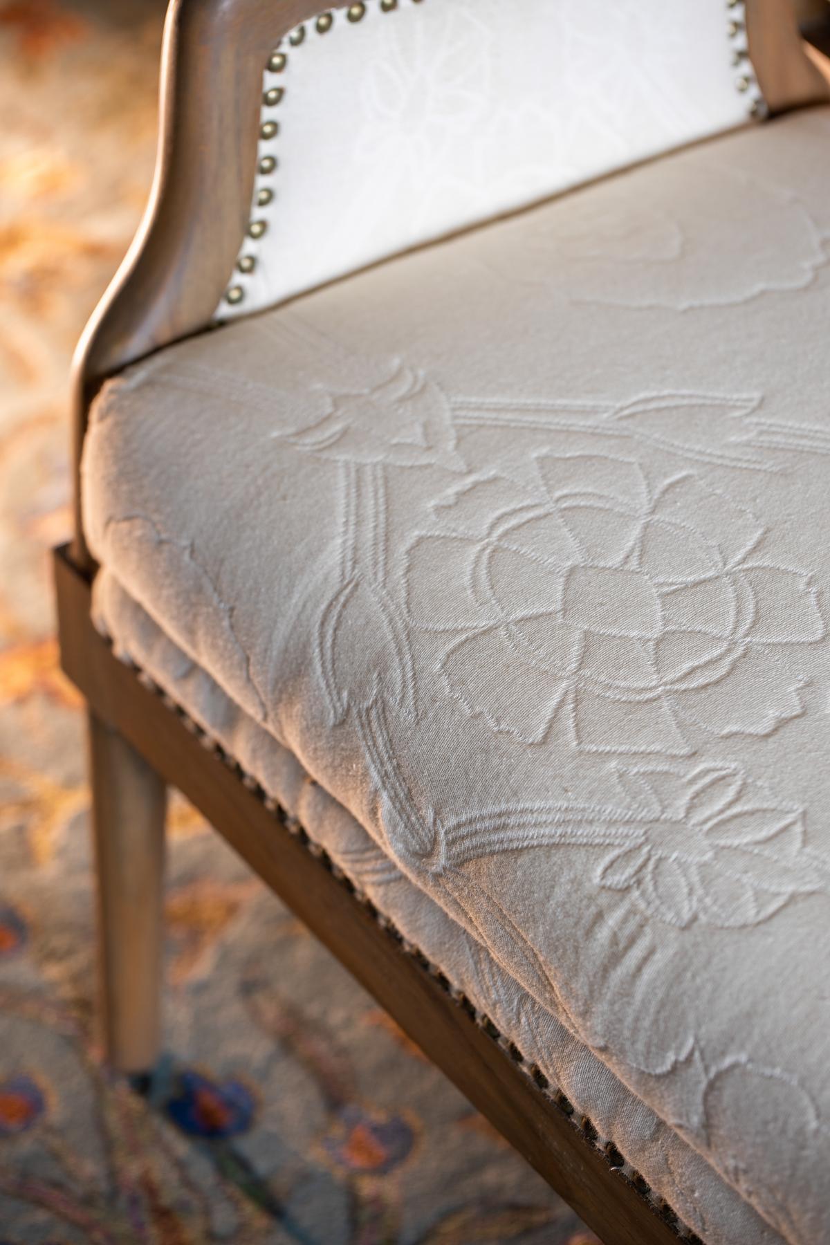 Floral accents on cushions and fabrics add layers of texture and comfort. Floral accents on cushions and fabrics add layers of texture and comfort.