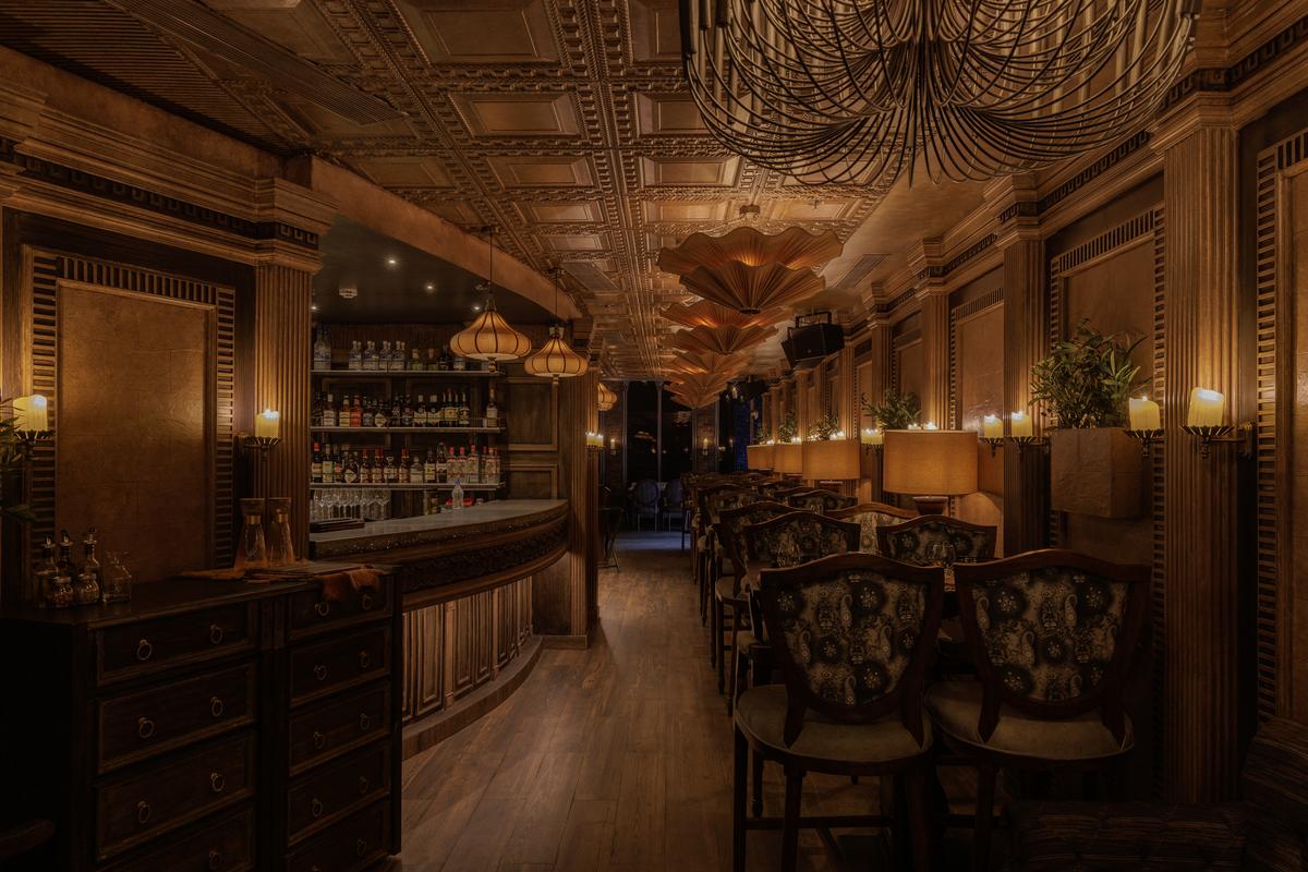 A perspective of the sleek, curved bar by Jade Design Studio. A perspective of the sleek, curved bar by Jade Design Studio.