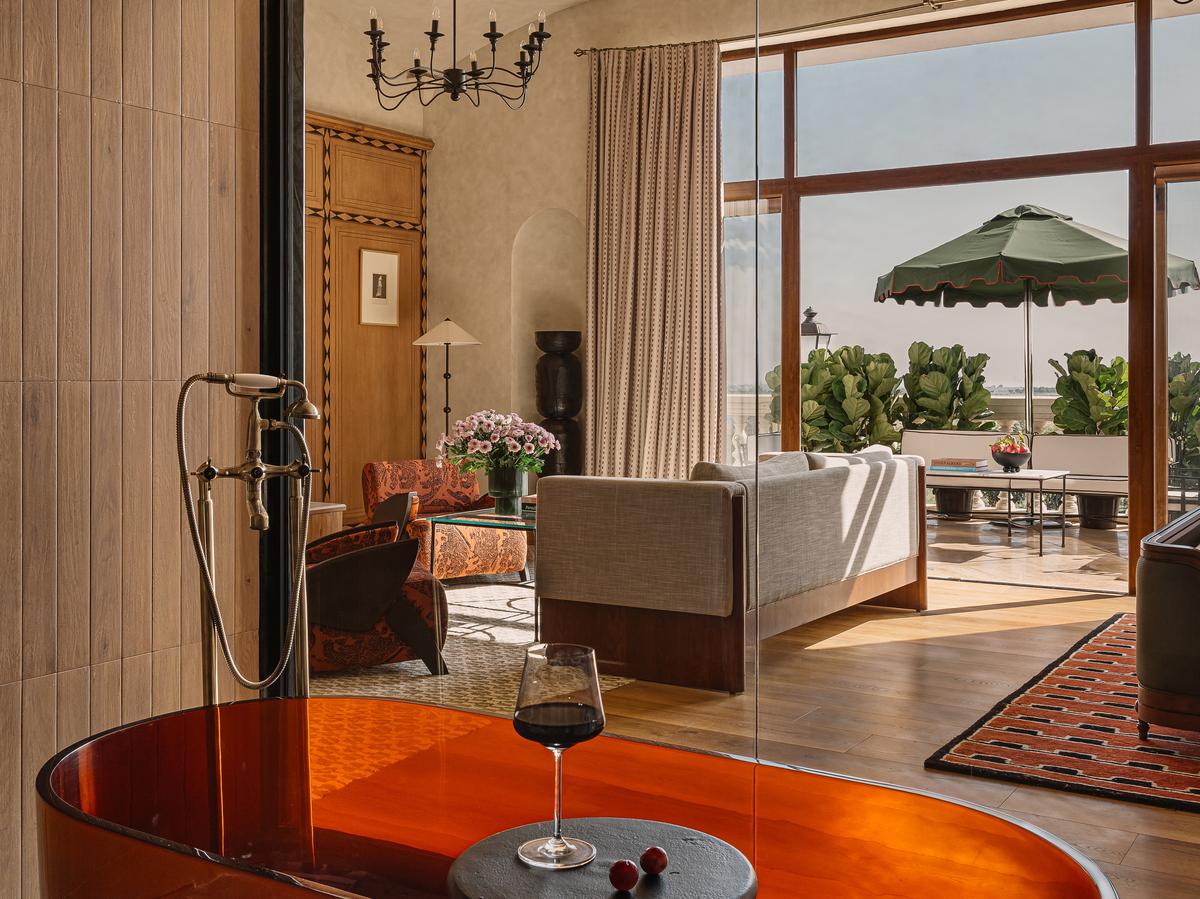 The imposing, neo-classical chateau, surrounded by a vineyard, is fronted by a grand fountain from the Mallya era. The imposing, neo-classical chateau, surrounded by a vineyard, is fronted by a grand fountain from the Mallya era.