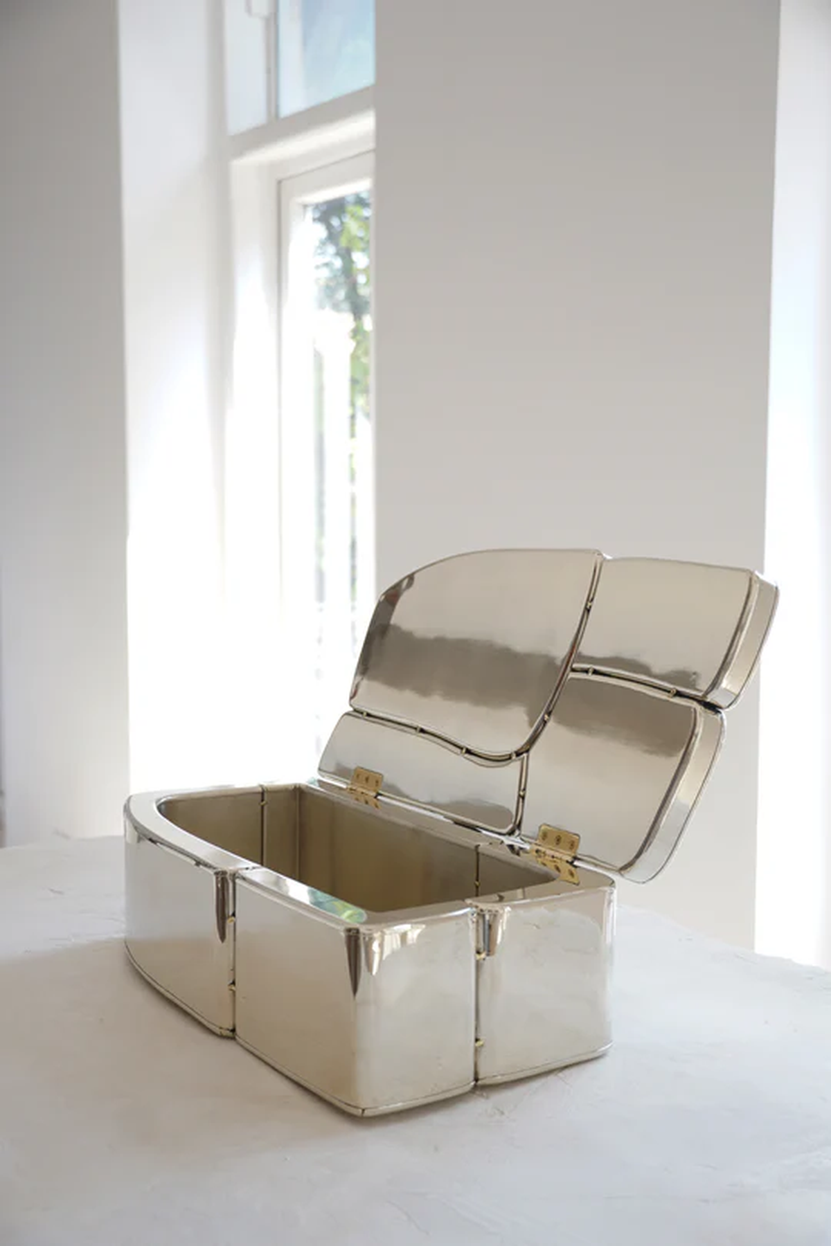 SLABS Treasure Box (SLABS Collection) in hammered silver sheet on wooden blocks attached with brass welds.