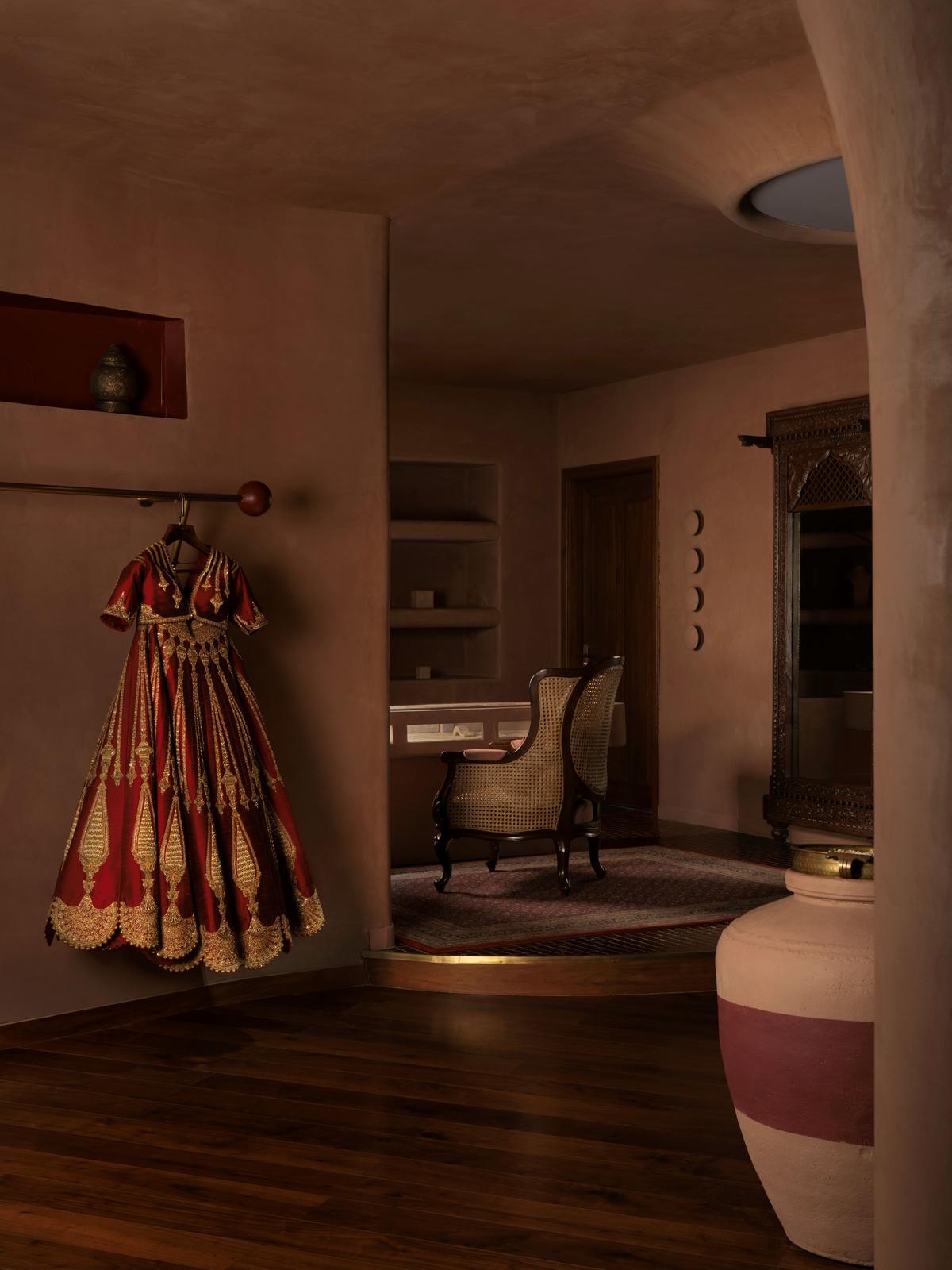 The store has alcoves with shimmering lehengas and tropical foliage for company.