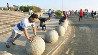 CHENNAI, TAMIL NADU, 07/03/2021: ( FOR METRO PLUS ) Morning walkers warming up at Marina Beach, in Chennai. Photo: Ravindran R/The Hindu