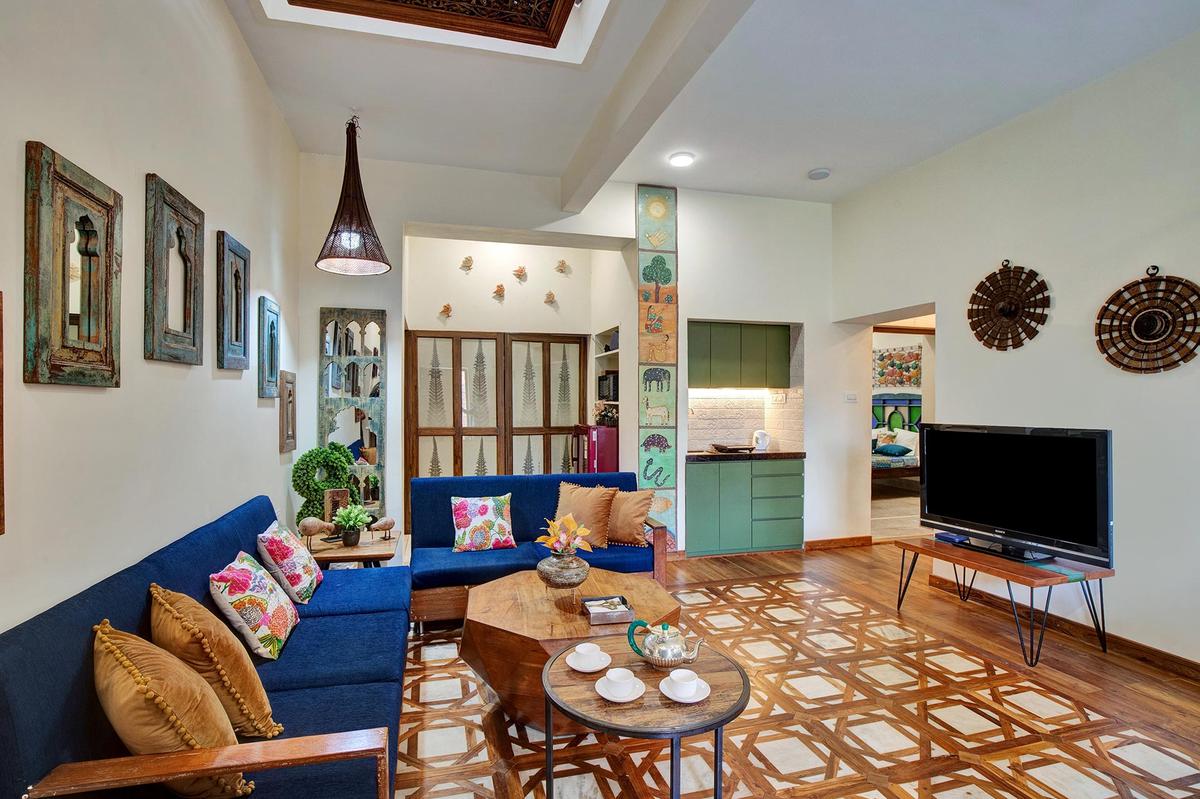 Madan Villa by THC. A checkered pattern adds a unique character to the overall space. 