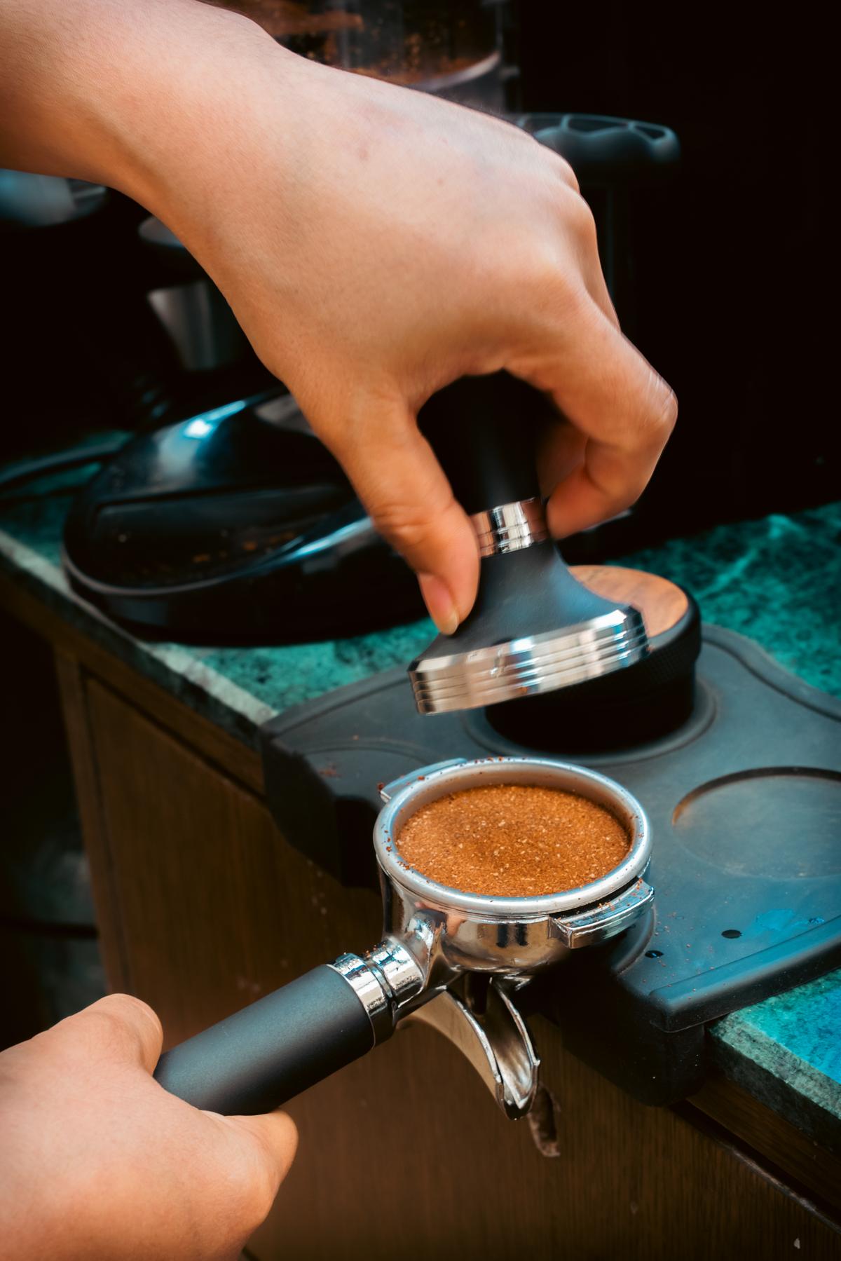 Beyond it, a leafy courtyard dotted with tables and board games could be anywhere in the world. Beyond it, a leafy courtyard dotted with tables and board games could be anywhere in the world.