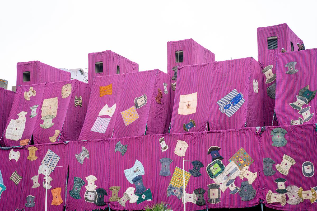 Ibrahim Mahama’s Purple Hibiscus during installation at the Barbican, 2024.