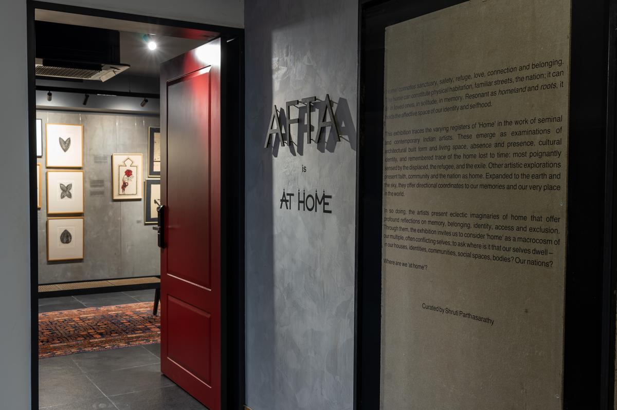 The entrance with grey tones mimicking the interiors.