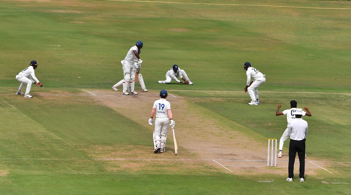 Short stay: Rohit Rayudu looks back to see his edge being snapped up by substitute Gnaneshwar off the bowling of Vijay on day one of the four-day Ranji Trophy Elite Group B match between Hyderabad and Andhra at the Rajiv Gandhi Stadium, Hyderabad, on Wednesday, November 13, 2024.  