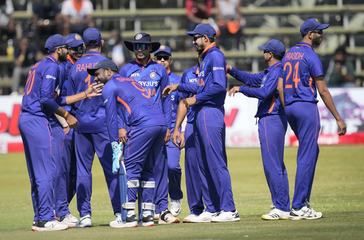 Indian players celebrate a wicket during the second one-day international match against Zimbabwe in Harare on August 20, 2022.