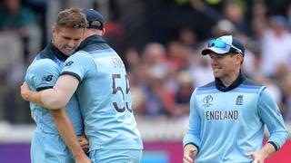 England's Chris Woakes celebrates the dismissal of Martin Guptill duringthe 2019 Cricket World Cup finals against New Zealand at Lord's in London on July 14, 2019.