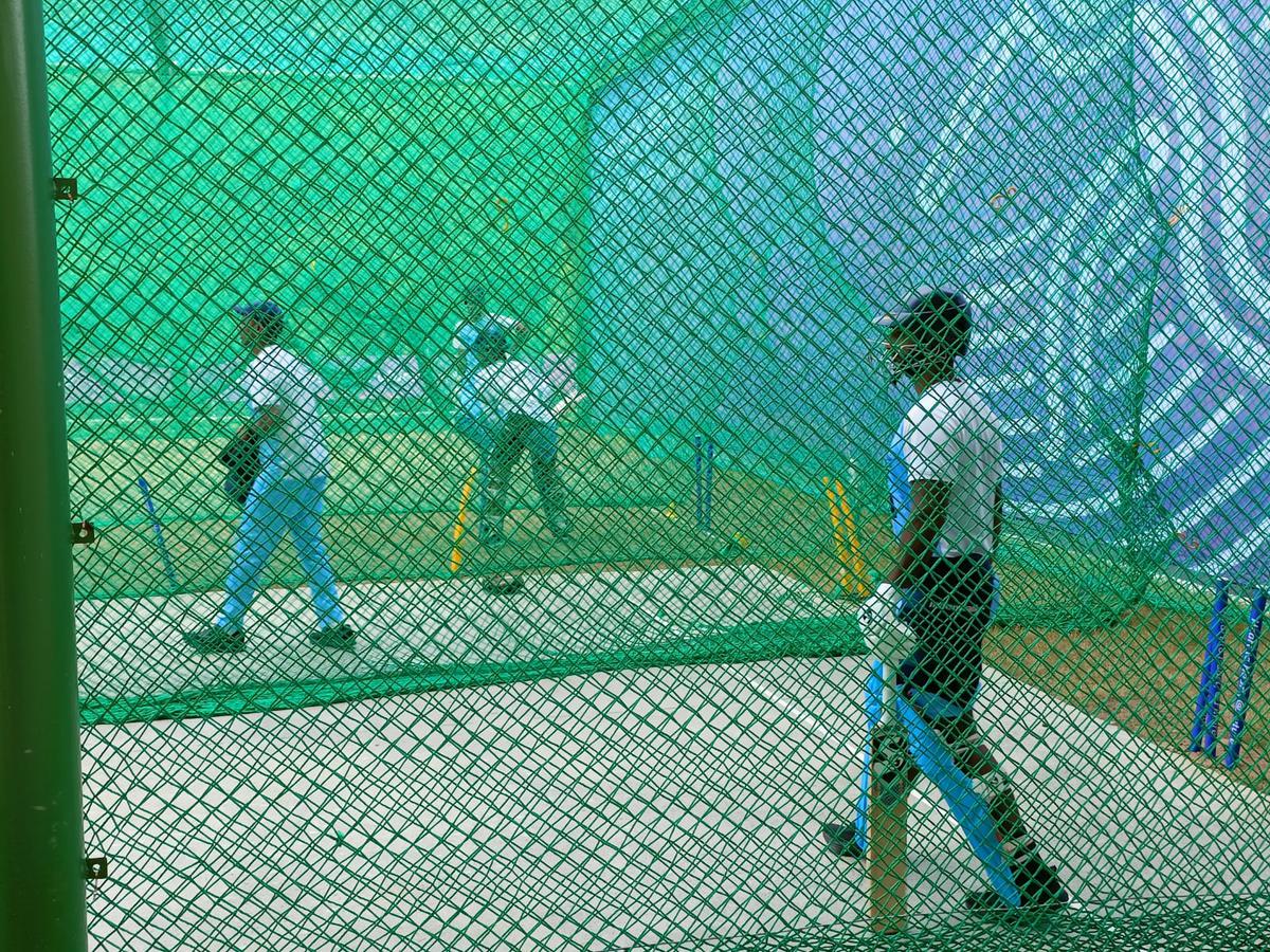 Indian cricketers are seen during a practice session ahead of the Nepal game.