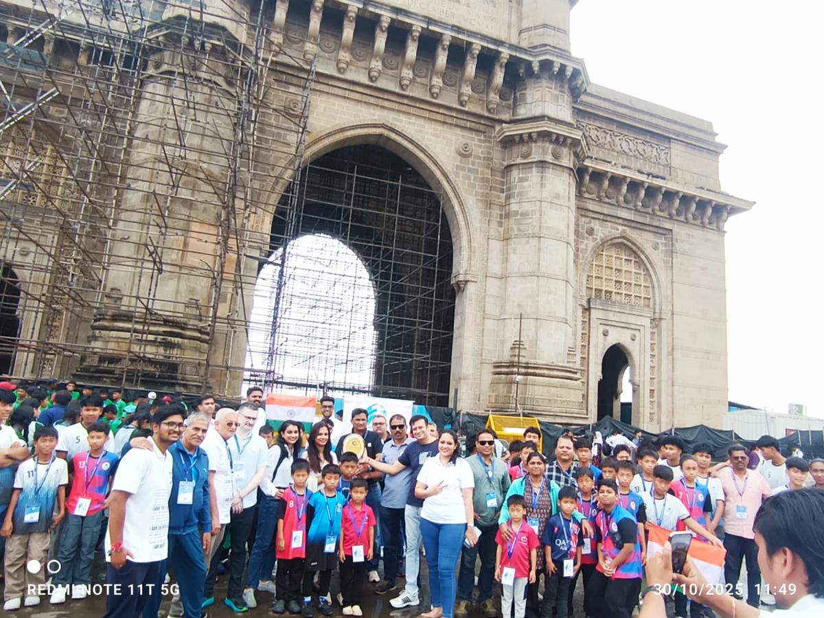 The underprivileged kids pose at the Gatway of India before cheering for India at the Women’s ODI World Cup semifinal in Navi Mumbai on Thursday. 