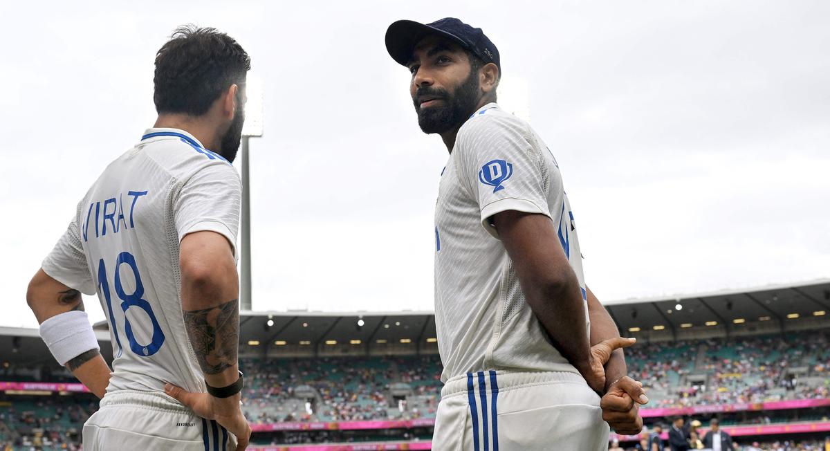 India’s Jasprit Bumrah and Virat Kohli wait to walk onto the field at the start of day one of the fifth Test match between Australia and India at the Sydney Cricket Ground. India’s Jasprit Bumrah and Virat Kohli wait to walk onto the field at the start of day one of the fifth Test match between Australia and India at the Sydney Cricket Ground.