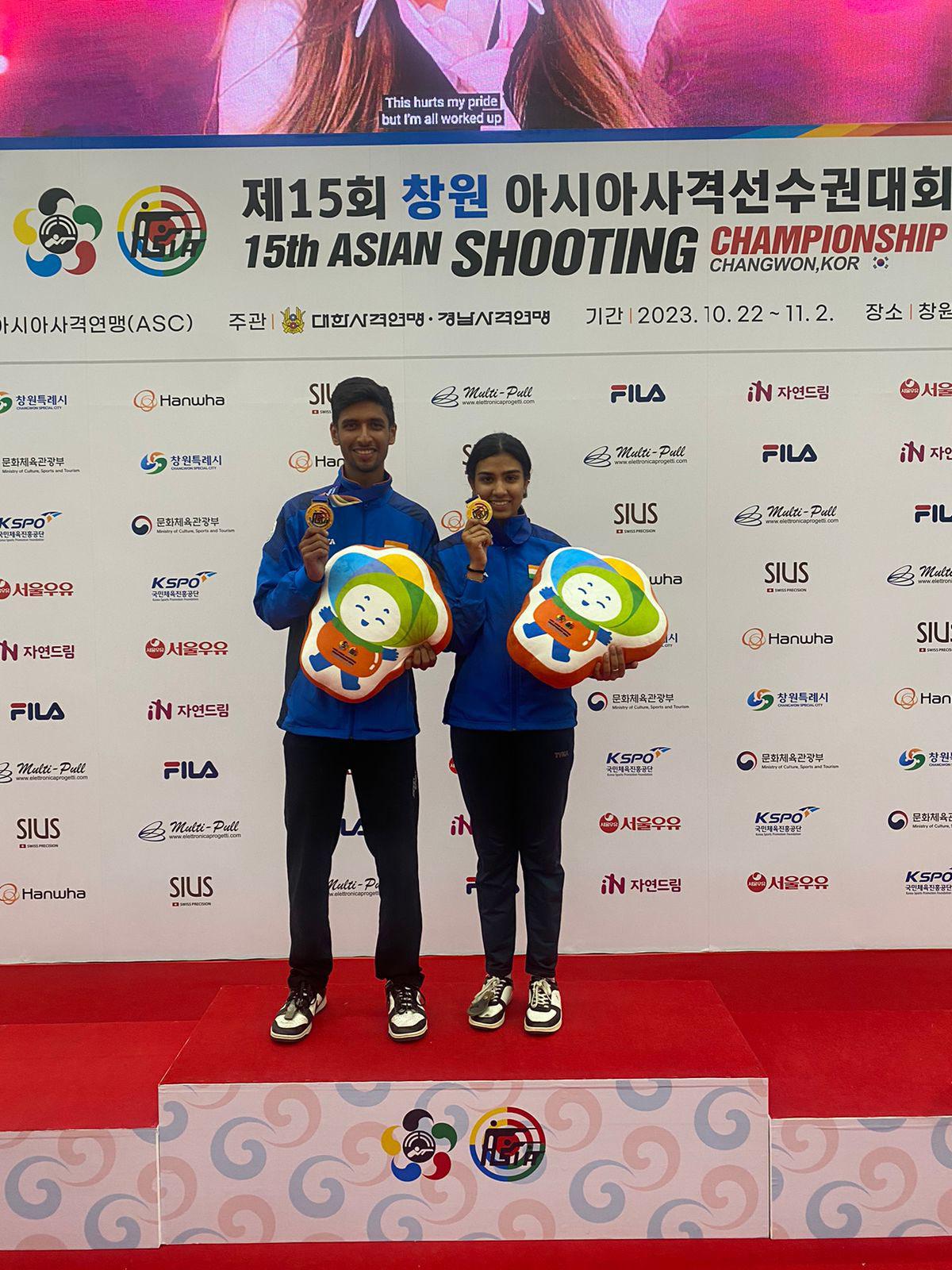 Raiza Dhillon and Harmehar Singh Lally after the success in the junior mixed skeet gold medals in the  Asian shooting championship in Changwon, Korea, on Friday.