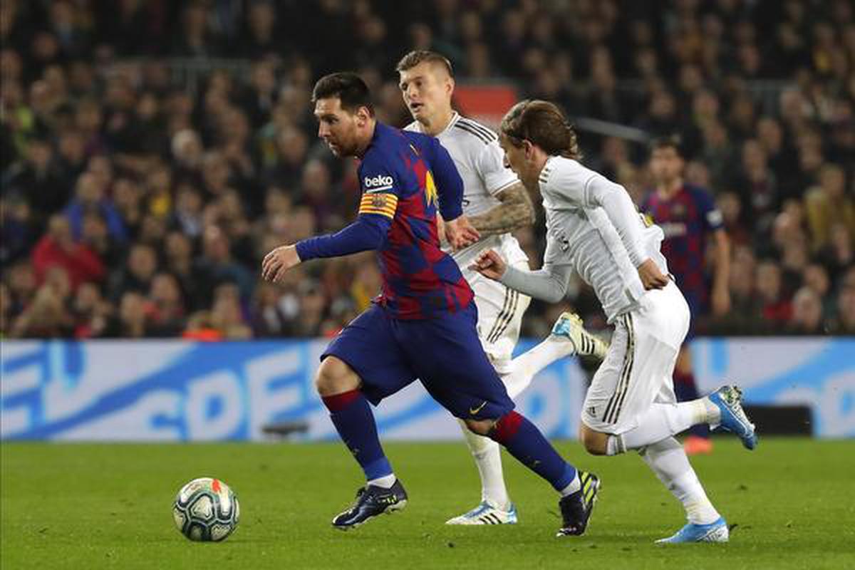 Barcelona and Real Madrid share spoils in goalless 'Clasico' marked by  Catalan protests