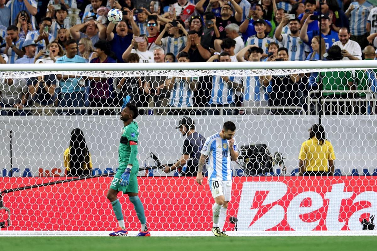 Argentina’s forward Lionel Messi gestures after missing a goal from the penalty spot during a penalty shoot out. 