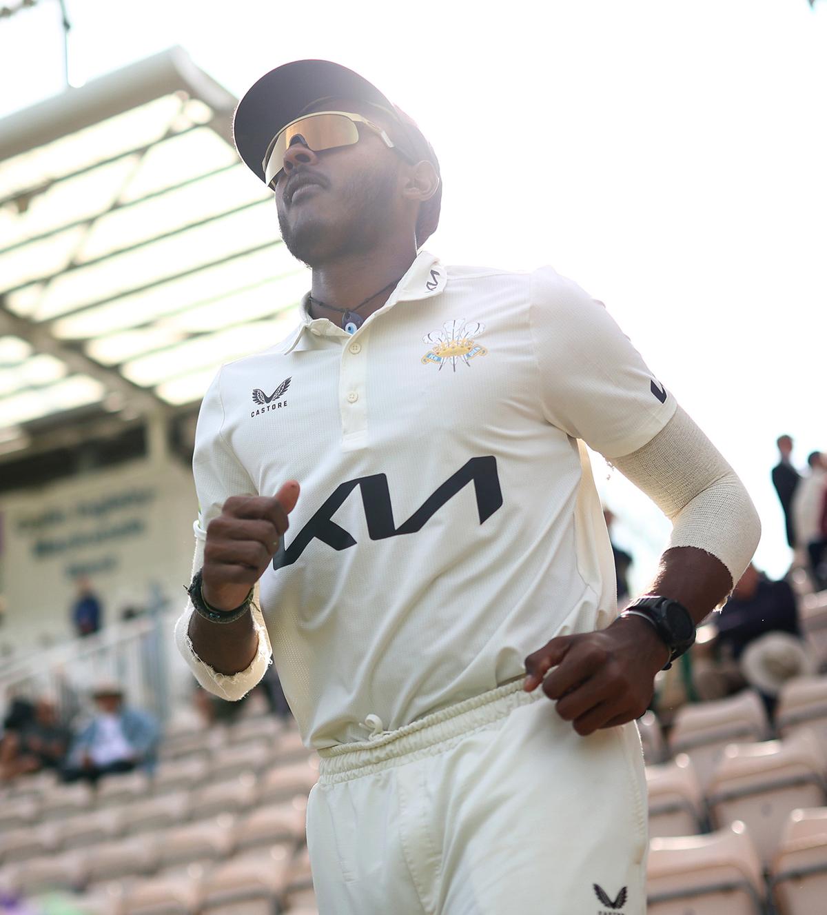 Sai Sudharsan of Surrey runs out into the field during day one of the County Championship Division 1 match between Hampshire and Surrey at Ageas Bowl on September 26, 2023.