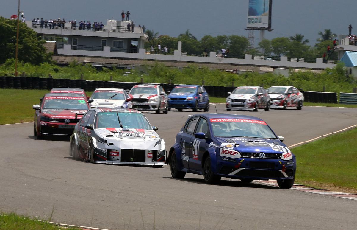 Saloon cars on the track.