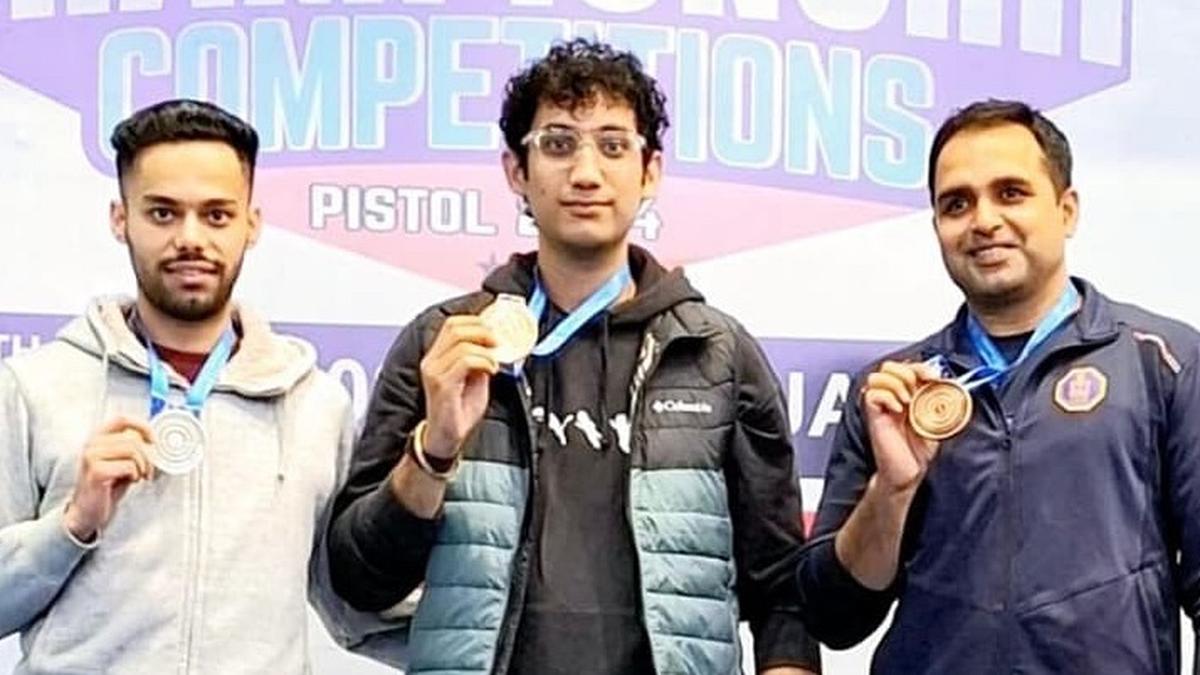 Adarsh wins standard pistol gold