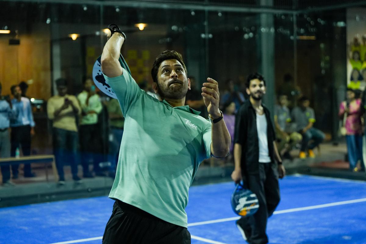 Dhoni tries his hand at padel. 