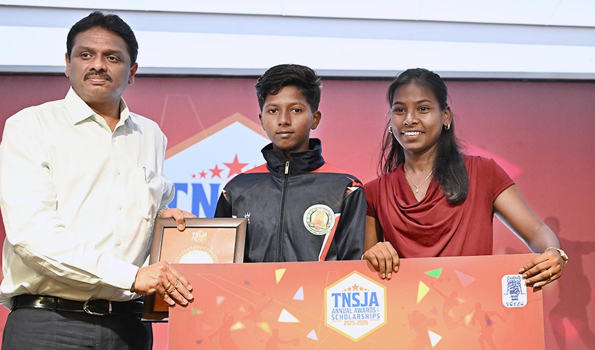 S. Dharshini’s scholarship given away by Srinivasa Raj and Sandhiya.