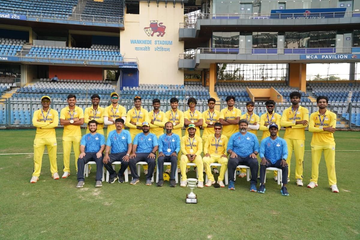 The triumphant Tamil Nadu squad with its reward.