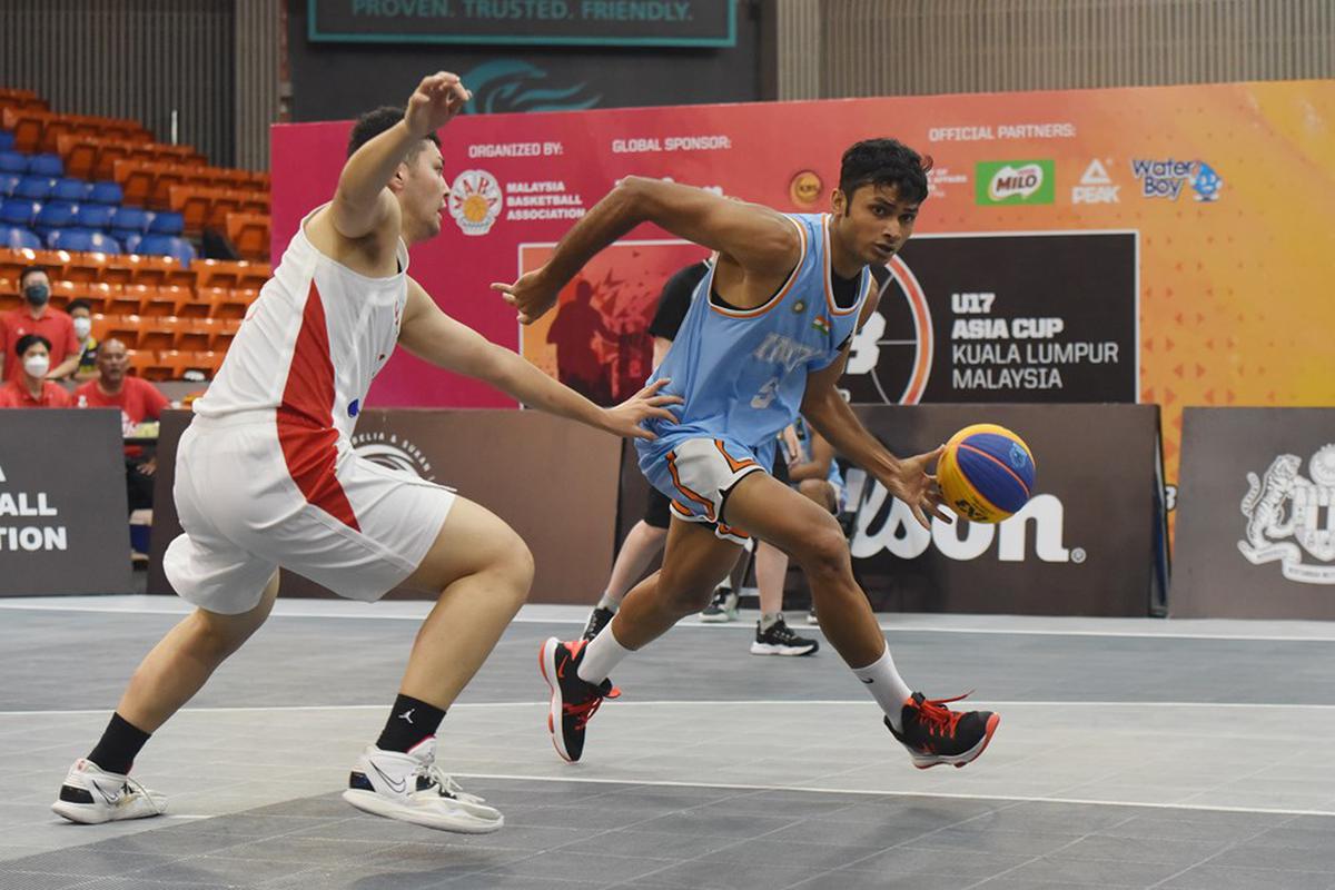 India’s Harsh Dagar finds a way past his Japanese challenger in the FIBA 3x3 under-17 Asia Cup in Kuala Lumpur on Sunday. 