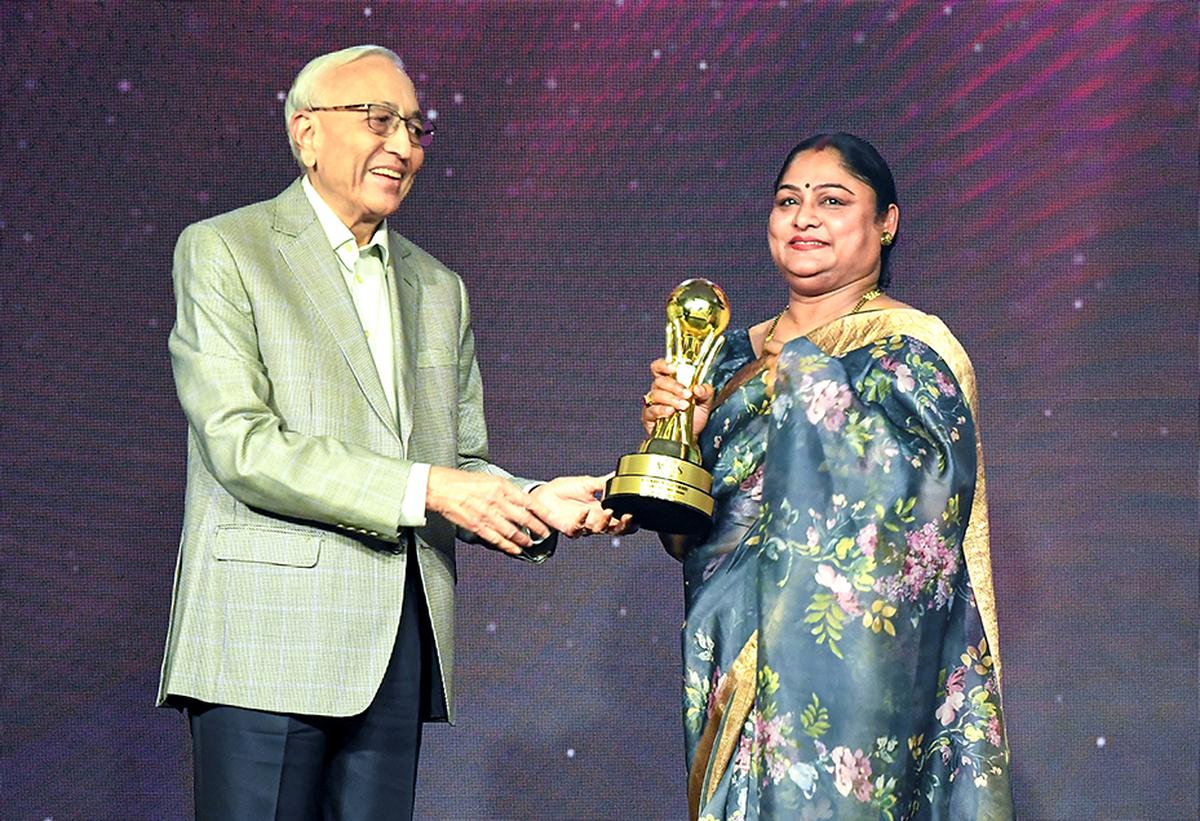 Karnam Malleswari Lifetime Achievement Award from N. Murali, Director, The Hindu Group.