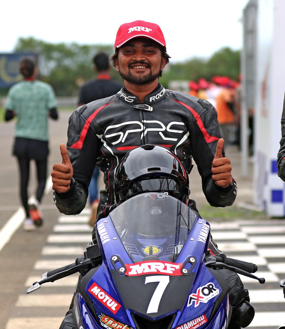 Sarvesh Balappa, who chalked up his fifth consecutive win in the Novice (Stock 165cc) category in the third round of the MRF MMSC FMSCI Indian National Motorcycle Racing Championship 2022 at the Madras International Circuit on Saturday, August 6, 2022.