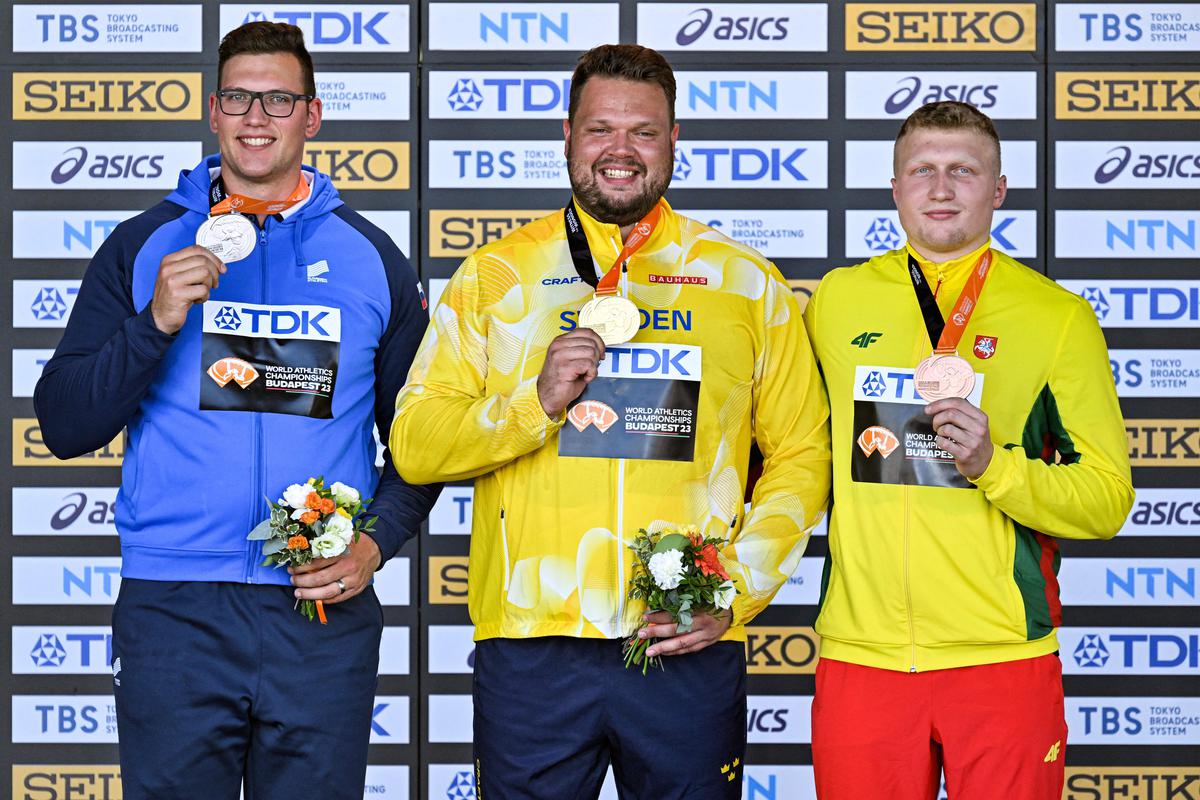 Battling giants: Alekna is determined to win the biggest titles, but with the likes of World champion Kristjan Ceh (left) and Olympic champion Daniel Stahl (centre) performing at a high level, the men’s discus is one of the hardest track and field events to medal in. | Photo credit: Getty Images