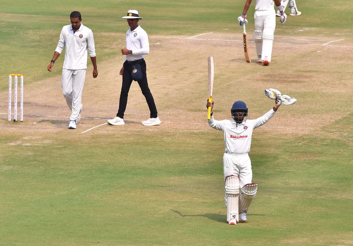 Pondicherry’s G. Sridhar Raju celebrates on reaching his milestone during the Ranji Trophy Elite Group B match between Hyderabad and Pondicherry at the Rajiv Gandhi Stadium, Hyderabad, on Tuesday, October 29, 2024.