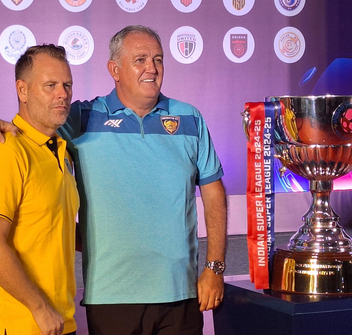 Chennaiyin FC head coach Owen Coyle, right, with Kerala Blasters head coach Mikael Strahre in Kochi on Thursday. 