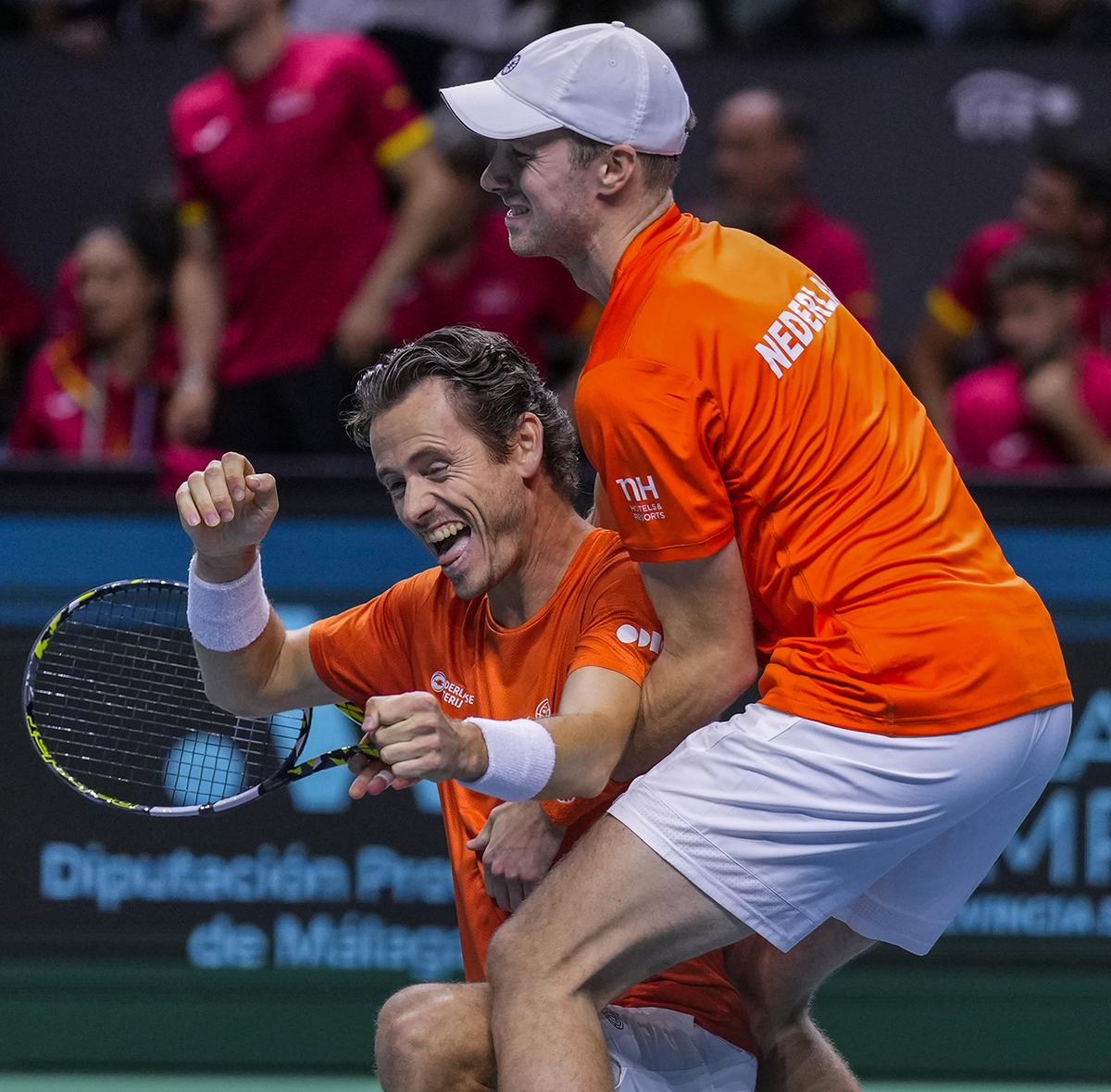 Netherlands' Wesley Koolhof, left, and Botic van de Zandschulp celebrate after winning against Spain's tennis player Carlos Alcaraz and Marcel Granollers during their doubles tennis quarterfinal Davis Cup match at Martin Carpena Sports Hall in Malaga, southern Spain, on Nov. 19, 2024. Netherlands' Wesley Koolhof, left, and Botic van de Zandschulp celebrate after winning against Spain's tennis player Carlos Alcaraz and Marcel Granollers during their doubles tennis quarterfinal Davis Cup match at Martin Carpena Sports Hall in Malaga, southern Spain, on Nov. 19, 2024.