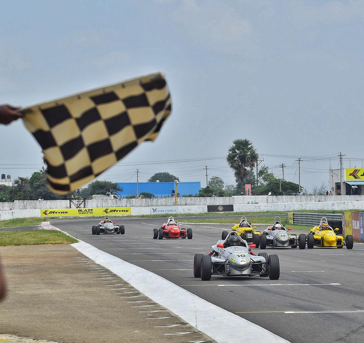 Arya Singh of Dark Don Racing takes the checkered flag in the second race of the LGB Formula 4 class