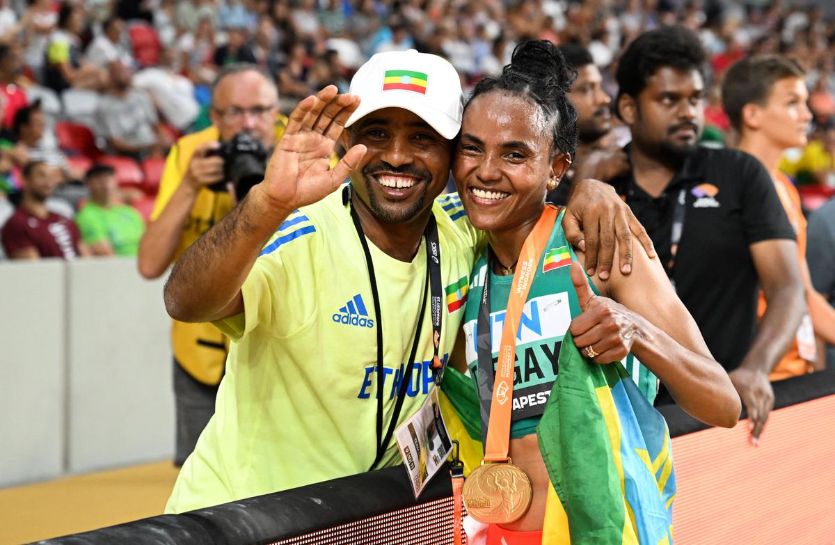 Pillar of strength: As husband and coach, former Ethiopian athlete Hiluf Yihdego has been a source of support for Tsegay. | Photo credit: Getty Images